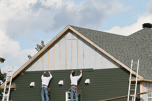 Professional Emergency Siding Repair technician working in Candler, NC